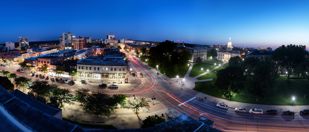 Phillips Hall rooftop sunset panorama of downtown Iowa City, Pentacrest and Clinton St / Iowa Ave intersection