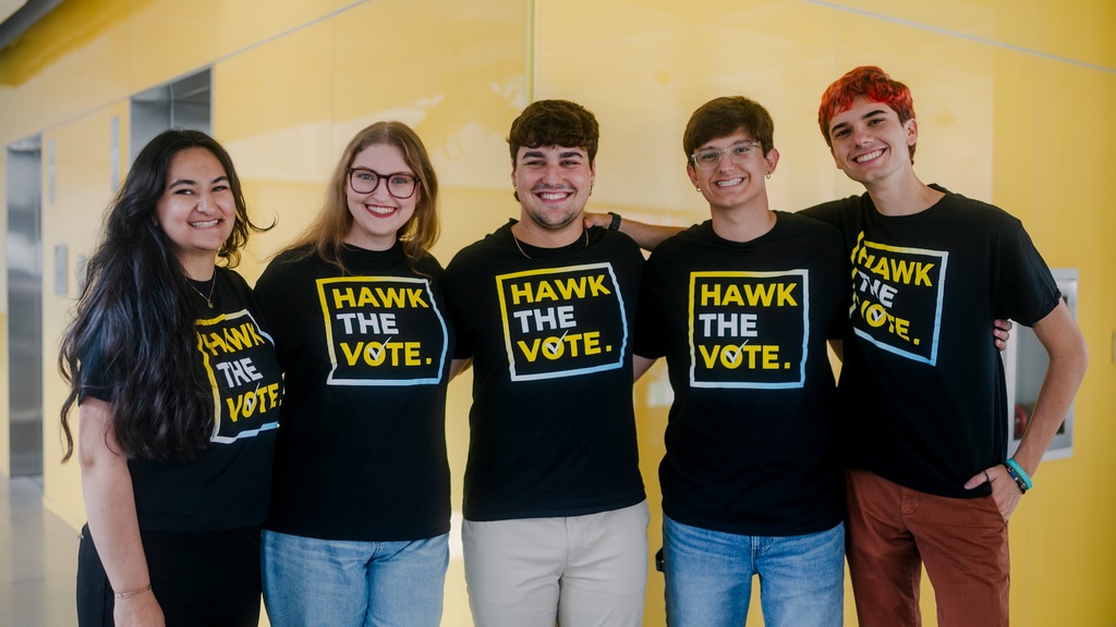 HTV Exec 2023-24 wearing HTV shirts.